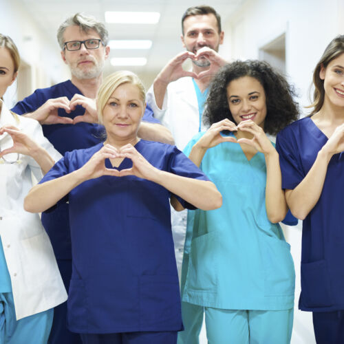 medical team with heart symbol